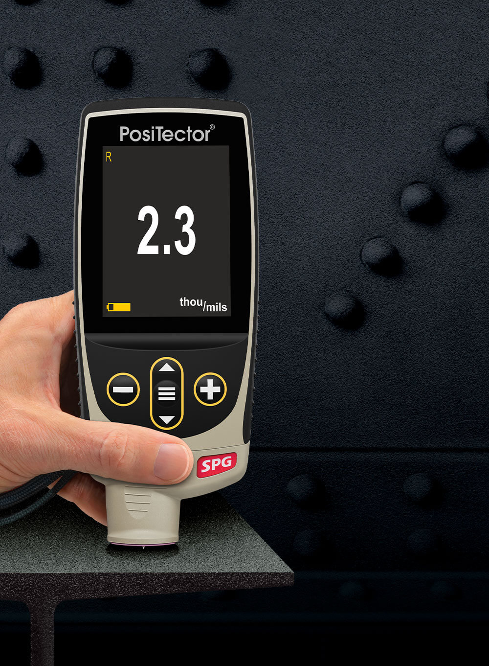 5fce60e0166cb138a9fc7c85_PosiTector-SPG-1000×1361-Measure-On-Steel-Ibeam.jpg